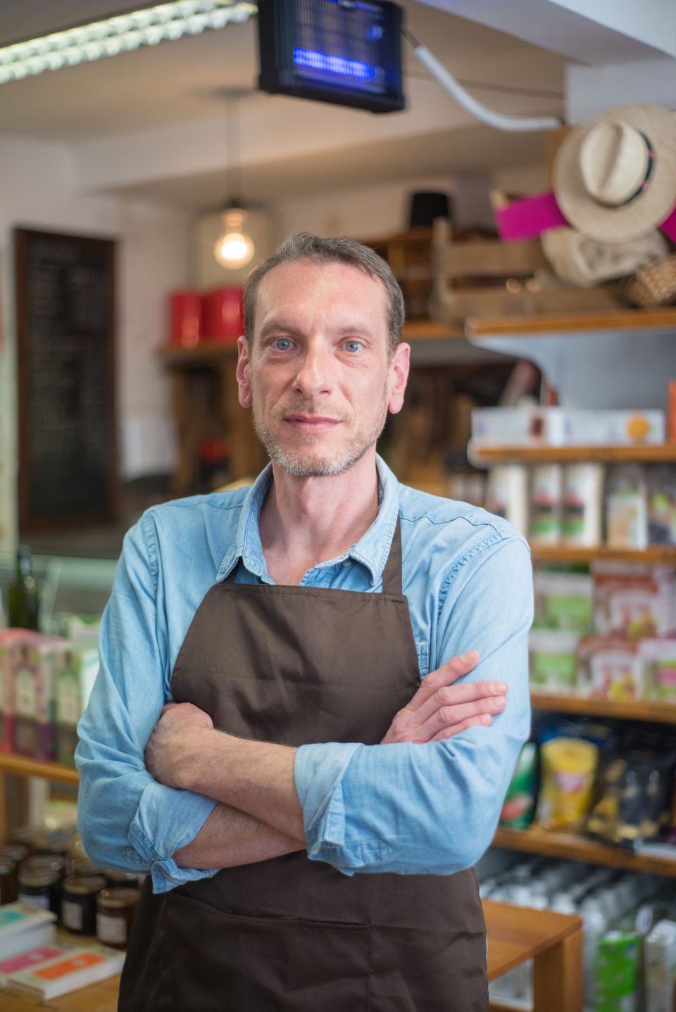 Small-business owner in a workshop, used in an illustrative service website concept